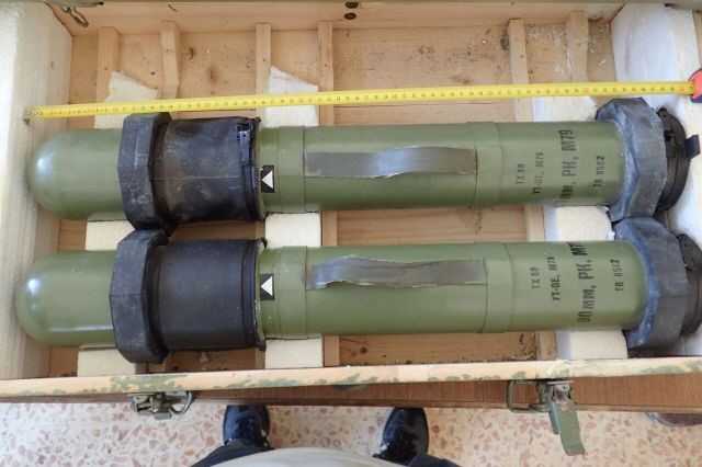 A closeup photo of two M79 Osa 90 mm HEAT rockets.
