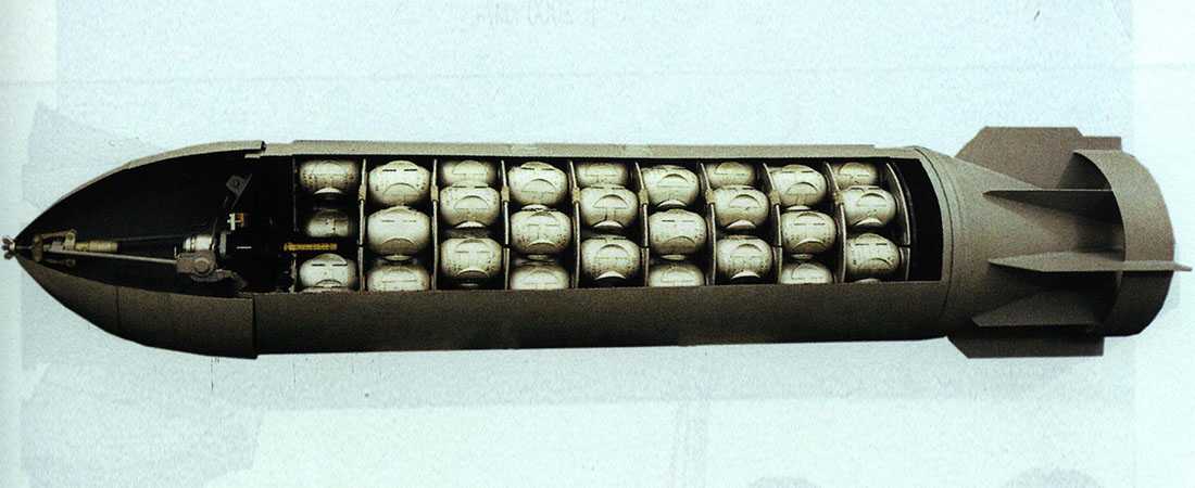 Picture of a cluster bomb that is open so the inside is visible