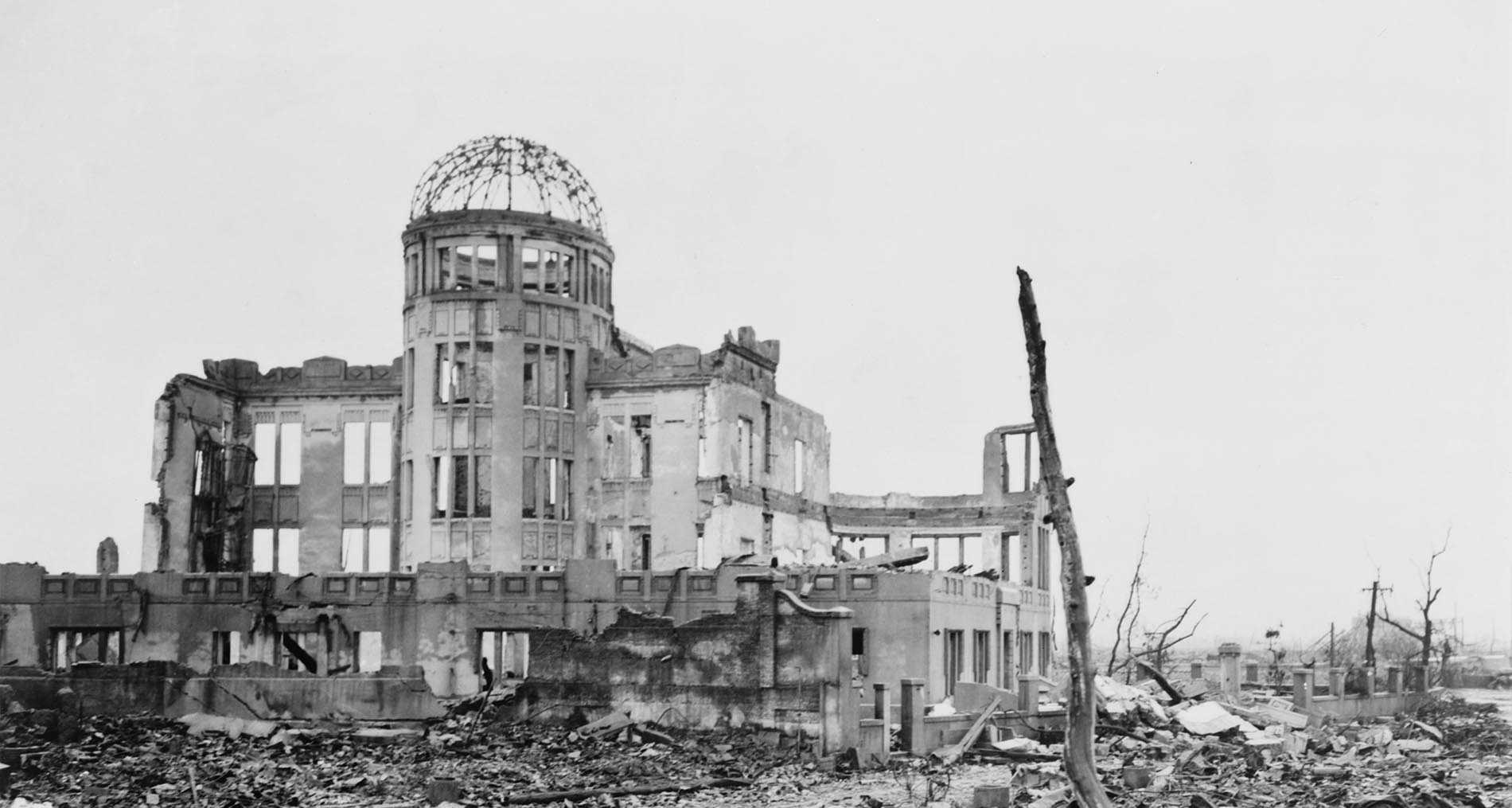 Debris field with a house ruin in Hiroshima.